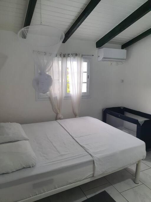 Le Sable Bleu - Evasion Tropicale A Sainte-Anne - Plage 5Min - Piscine - Parking - Logement Climatise - Vue Sur Les Palmiers - Parfait Pour Sejours En Famille Ou Entre Amis Exterior foto